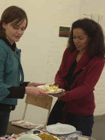 Lisa Gordon presenting a slice of passion fruit pavlova. Enlarge Picture